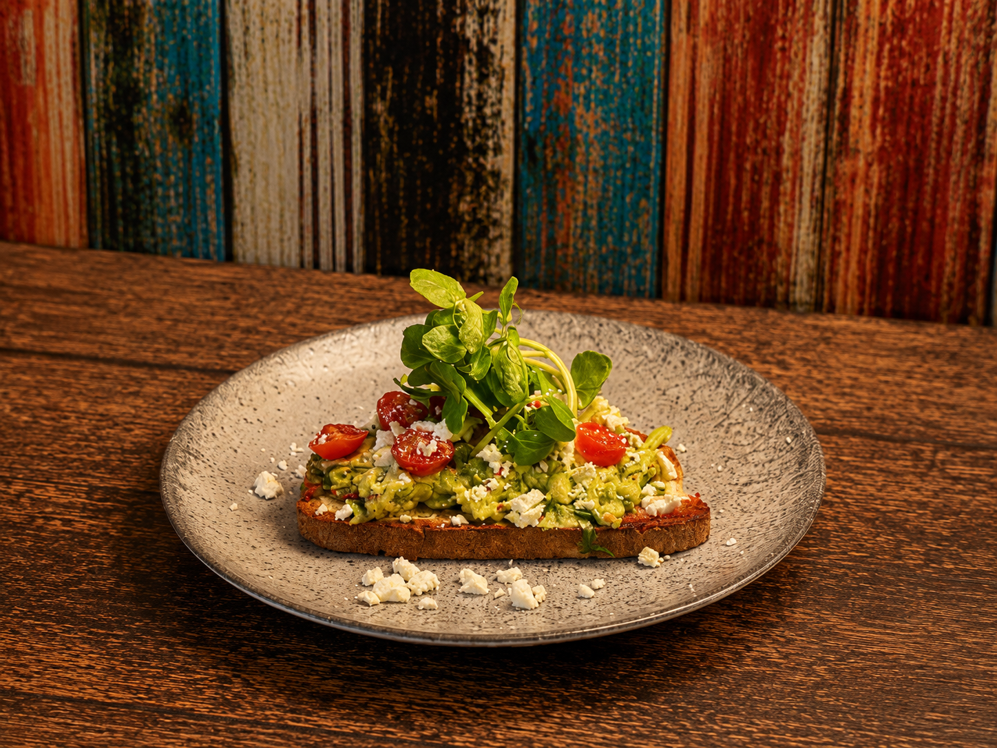 Fresh avocado toast topped with cheese