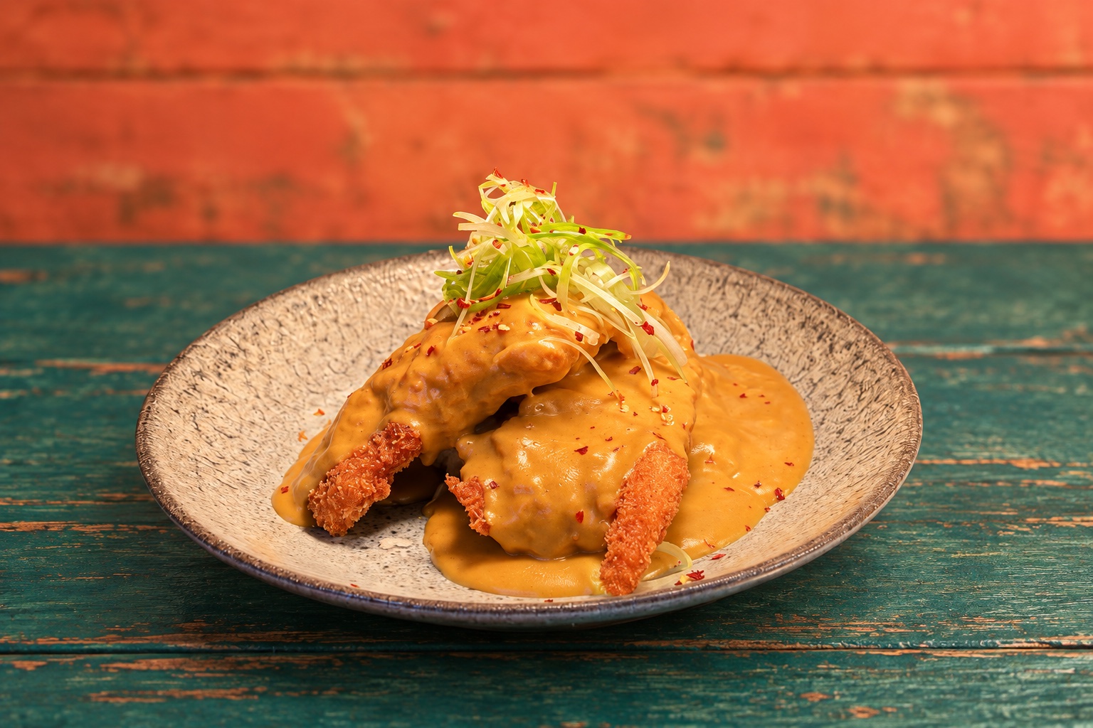 Crispy chicken with a rich sauce